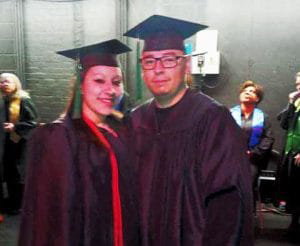 Celebrating is a pair of IntelliTec College of Pueblo Medical Assistant program graduates - Valerie Valdex and her husband Michael Ybarra.